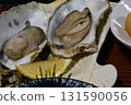 Dinner at the guesthouse: a mountain of seafood: hairy crab, sea urchin, oysters 131590056