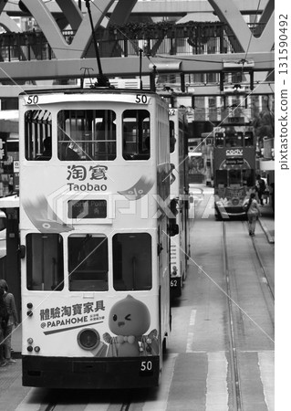 Monochrome Hong Kong: Trams (streetcars), the means of transportation for the common people in Hong Kong, have been running since the British colonial period 131590492