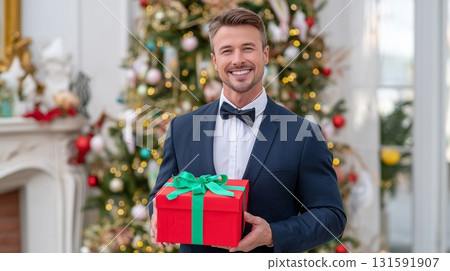 close up of happy man with gift box at cafe 131591907