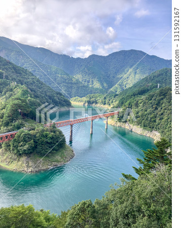 Okuoikojo Station and the red bridge across Lake Sesso Okuoikojo Station and the red bridge across Lake Sesso 131592167