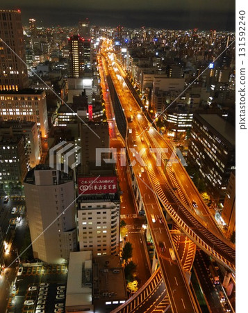 Night city seen from the top of a building Night city seen from the top of a building 131592240