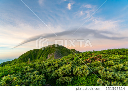 View of the morning glow of Mt. Kamikawachi from the summit of Mt. Minami in the Southern Alps. Climbing Mt. Hijiri in the Southern Alps View of the morning glow of Mt. Kamikawachi from the summit of Mt. Minami in the Southern Alps. Climbing Mt. Hijiri in the Southern Alps 131592814
