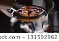 pull espresso shot with bottomless portafilter on a professional coffee machine 131592962