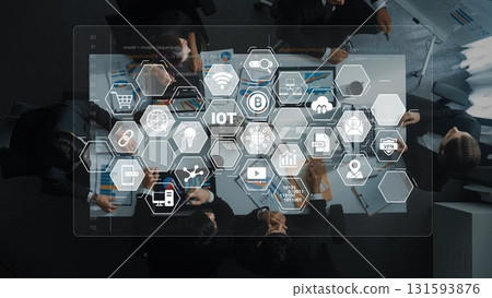 Diverse Business Team Collaborating on Technology Strategies with IoT Icons and Charts Representing Data Insights in Modern Office Setting. Raster Diverse Business Team Collaborating on Technology Strategies with IoT Icons and Charts Representing Data Insights in Modern Office Setting. Raster 131593876