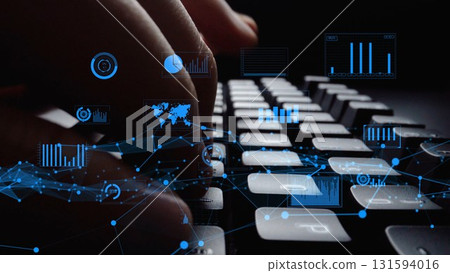 Close-up View of Hands Typing on Keyboard with Digital Graphs and Data Visualizations in Futuristic Technology Concept xenic Close-up View of Hands Typing on Keyboard with Digital Graphs and Data Visualizations in Futuristic Technology Concept xenic 131594016