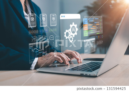 Businesswoman using AI technology for project management, workflow automation and data analytics on laptop. Modern artificial intelligence solutions for corporate digital transformation. AI project 131594425