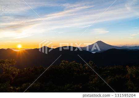 Mount Fuji during the magic hour as seen from the summit of Mount Minami in the Southern Alps. Climbing Mount Hijiri in the Southern Alps 131595204