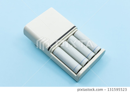 Rechargeable AA batteries and charger Rechargeable AA batteries and charger 131595523