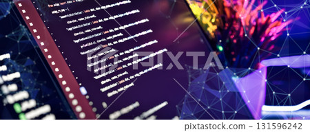 Colorful developer workspace with neural network overlay 131596242