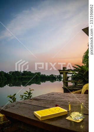 Golden hour with good pages good pour and the river flowing by 131598662