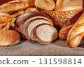 Fresh baked bread. Assorted bakery products loafs of bread and rolls... 131598814