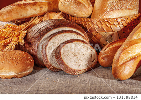 Fresh baked bread. Assorted bakery products loafs of bread and rolls... 131598814