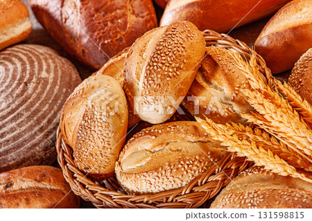 Fresh baked bread. Assorted bakery products loafs of bread and rolls... 131598815
