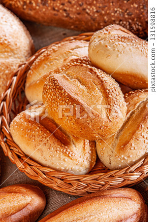 Fresh baked bread. Assorted bakery products loafs of bread and rolls... Fresh baked bread. Assorted bakery products loafs of bread and rolls... 131598816