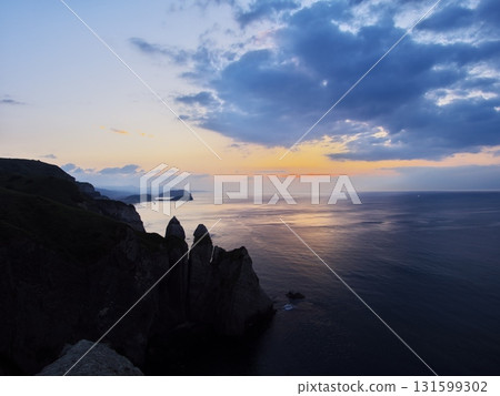 Muroran, Hokkaido, summer: View of the sea bathed in the morning glow from near Kameiwa Muroran, Hokkaido, summer: View of the sea bathed in the morning glow from near Kameiwa 131599302