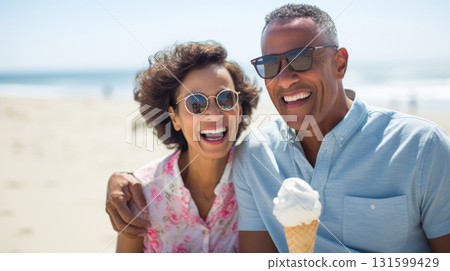POC Middle age couple enjoying time on beach. Summer holiday, man and woman POC Middle age couple enjoying time on beach. Summer holiday, man and woman 131599429