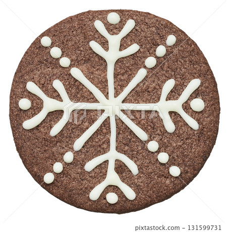 Snowflake design chocolate cookies with icing on a white background Snowflake design chocolate cookies with icing on a white background 131599731