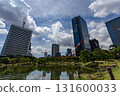 Tokyo's Kyu-Shiba Rikyu Gardens, with skyscrapers reflected in the pond and a dynamic blue sky Tokyo's Kyu-Shiba Rikyu Gardens, with skyscrapers reflected in the pond and a dynamic blue sky 131600033