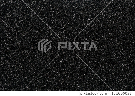 Abstract background of black kitchen sponge. Abstract background of black kitchen sponge. 131600055