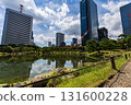 Tokyo's Kyu-Shiba Rikyu Gardens, with its green spaces and skyscrapers reflected on the water Tokyo's Kyu-Shiba Rikyu Gardens, with its green spaces and skyscrapers reflected on the water 131600228