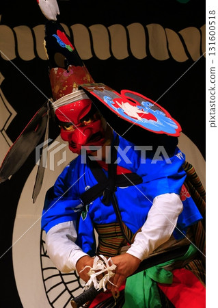 Man carrying a portable shrine 131600518