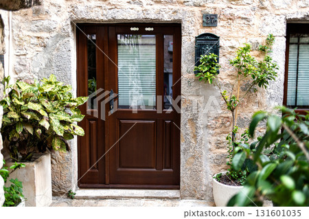 Cozy Courtyard Design and Home Entrance in Budva Old Town, Montenegro. Cozy Courtyard Design and Home Entrance in Budva Old Town, Montenegro. 131601035