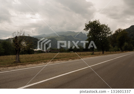 A cloudy day in a mountain valley A cloudy day in a mountain valley 131601337