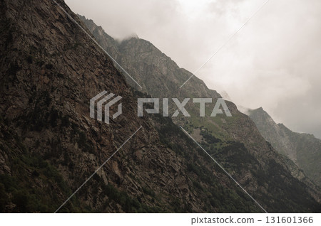 close-up of the texture of the steep, rocky mountain slopes close-up of the texture of the steep, rocky mountain slopes 131601366