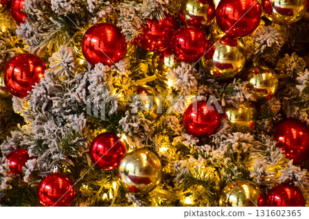 Close-up of the Christmas trees with colorful ornaments. Festive decoration. Full of ornaments. Winter season, winter festive. Christmas celebration, Xmas celebration. For background use. Close-up of the Christmas trees with colorful ornaments. Festive decoration. Full of ornaments. Winter season, winter festive. Christmas celebration, Xmas celebration. For background use. 131602365