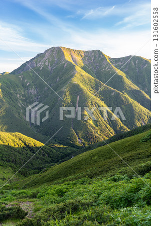 Mt. Hijiri (Mae Hijiri, Oku Hijiri) in the Southern Alps, seen from Mt. Minami in the Southern Alps. Hijiri climbing in the Southern Alps. Mt. Hijiri (Mae Hijiri, Oku Hijiri) in the Southern Alps, seen from Mt. Minami in the Southern Alps. Hijiri climbing in the Southern Alps. 131602558