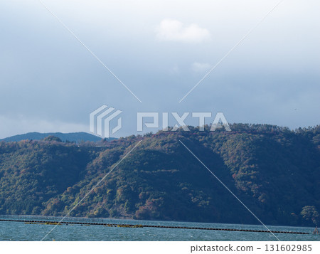 Sunny autumn sky and mountain range Sunny autumn sky and mountain range 131602985