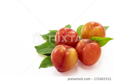 Plums on a white background 131603312