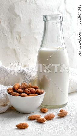 Soft minimalist food still life with plant-based milk and healthy snack ingredients. 131604045