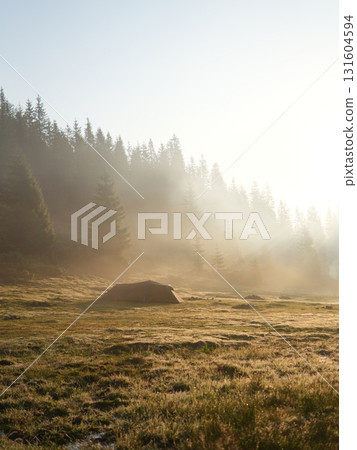 Beautiful mountain landscape, light over peaks and valleys, natural scenery, calm atmosphere and wild nature Beautiful mountain landscape, light over peaks and valleys, natural scenery, calm atmosphere and wild nature 131604594