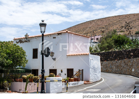 A white-walled building under bright sunlight in Betancuria, inland on Fuerteventura in the Canary Islands A white-walled building under bright sunlight in Betancuria, inland on Fuerteventura in the Canary Islands 131604608