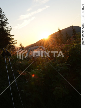 Beautiful mountain landscape, light over peaks and valleys, natural scenery, calm atmosphere and wild nature Beautiful mountain landscape, light over peaks and valleys, natural scenery, calm atmosphere and wild nature 131604621