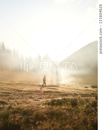 Beautiful mountain landscape, light over peaks and valleys, natural scenery, calm atmosphere and wild nature Beautiful mountain landscape, light over peaks and valleys, natural scenery, calm atmosphere and wild nature 131604626