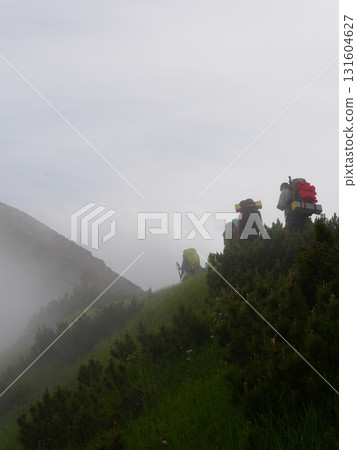 Beautiful mountain landscape, light over peaks and valleys, natural scenery, calm atmosphere and wild nature 131604627