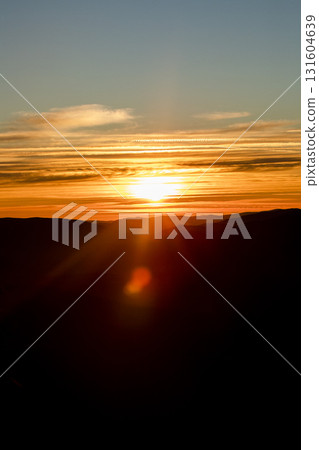 Beautiful mountain landscape, light over peaks and valleys, natural scenery, calm atmosphere and wild nature 131604639
