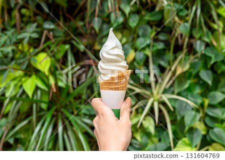 Soft serve ice cream in my hand 131604769