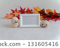 Wooden ghost and pumpkin objects and photo frames 131605416