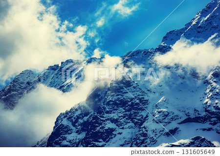 Mountain peaks near Morskie Oko Lake in Poland at Winter. Tatras range 131605649