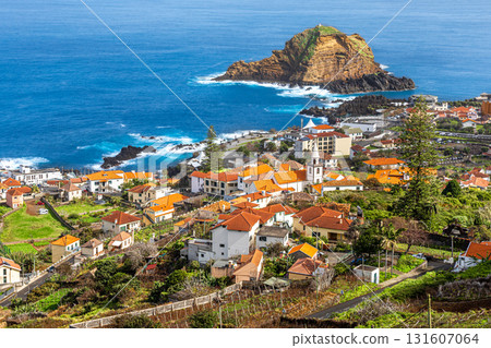 View of the small resort village of Porto Moniz on the Atlantic coast of Madeira Island, Portugal View of the small resort village of Porto Moniz on the Atlantic coast of Madeira Island, Portugal 131607064