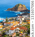 View of the small resort village of Porto Moniz on the Atlantic coast of Madeira Island, Portugal 131607066