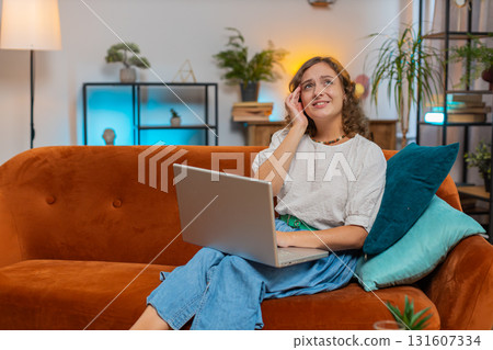Tired young woman using laptop suffering from headache problem tension and migraine stress at home Tired young woman using laptop suffering from headache problem tension and migraine stress at home 131607334