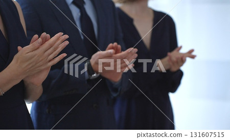 Business audience hands clapping, showing appreciation and success in a corporate meeting, celebrating achievement and positive feedback at a professional event Business audience hands clapping, showing appreciation and success in a corporate meeting, celebrating achievement and positive feedback at a professional event 131607515