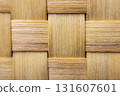 Close up of woven bamboo pattern showcasing intricate texture and natural tones. interlaced design highlights craftsmanship and organic beauty of material 131607601