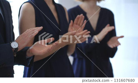 Business people hands clapping, showing applause and appreciation for success and achievement during a corporate event or conference meeting Business people hands clapping, showing applause and appreciation for success and achievement during a corporate event or conference meeting 131607680