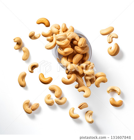 Photo a pile of cashew nuts on a white background. Photo a pile of cashew nuts on a white background. 131607848