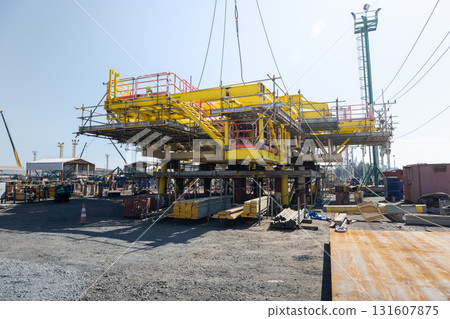 Oil rig construction with crane. 131607875